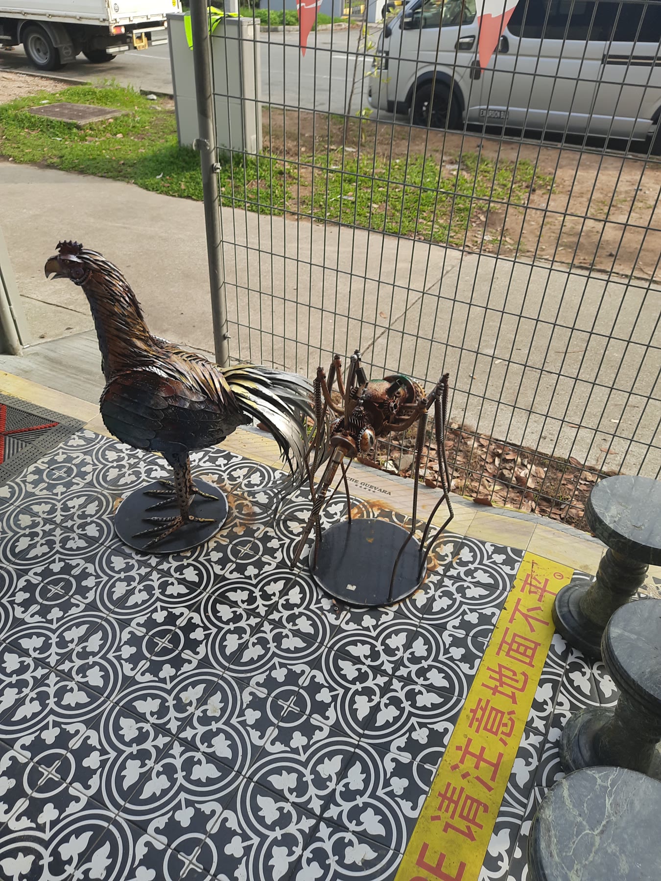 Artwork detail and surrounding walkway