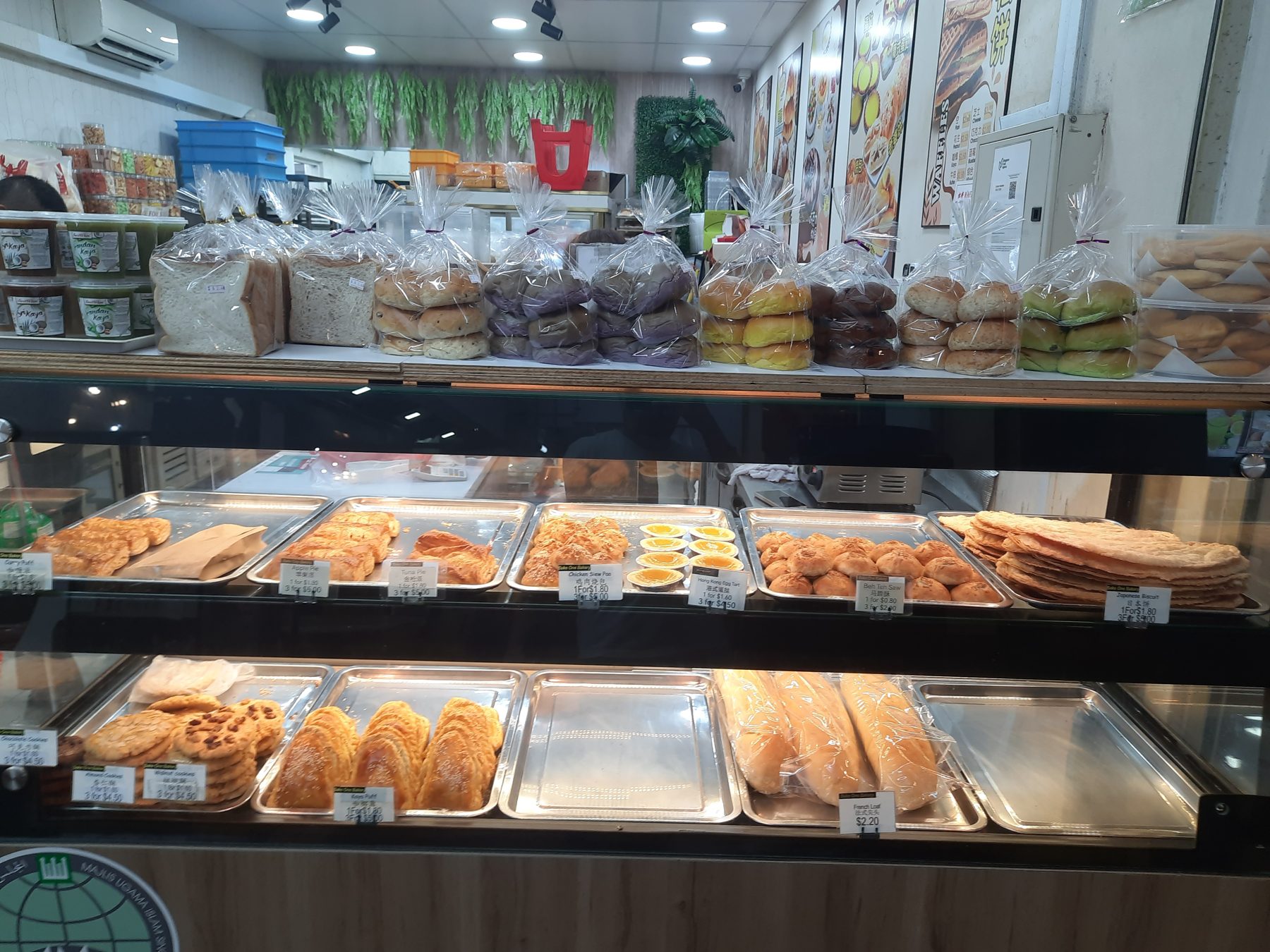 Bake One Bakery pastry display, including the large Japanese biscuits